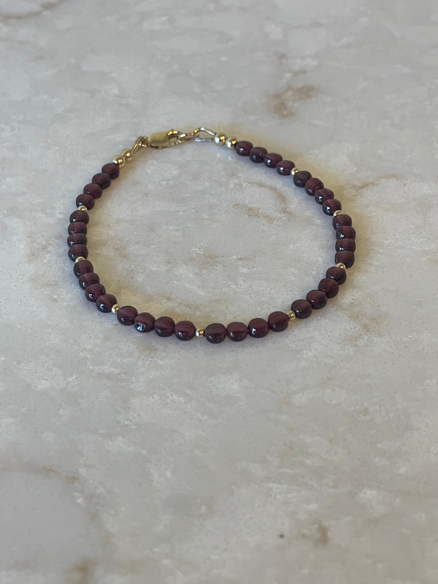 Garnet coin shaped bracelet