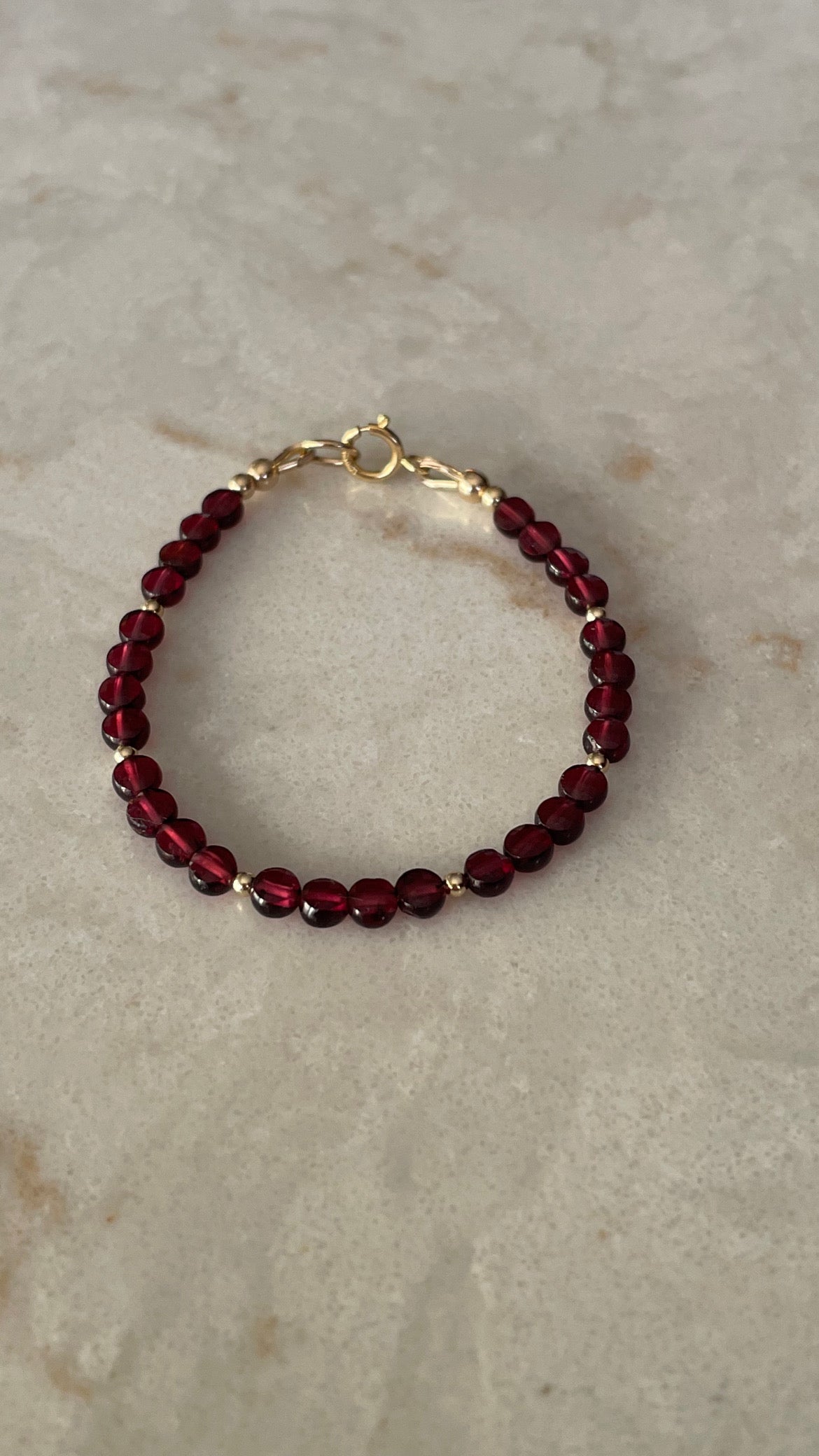 Garnet coin shaped bracelet