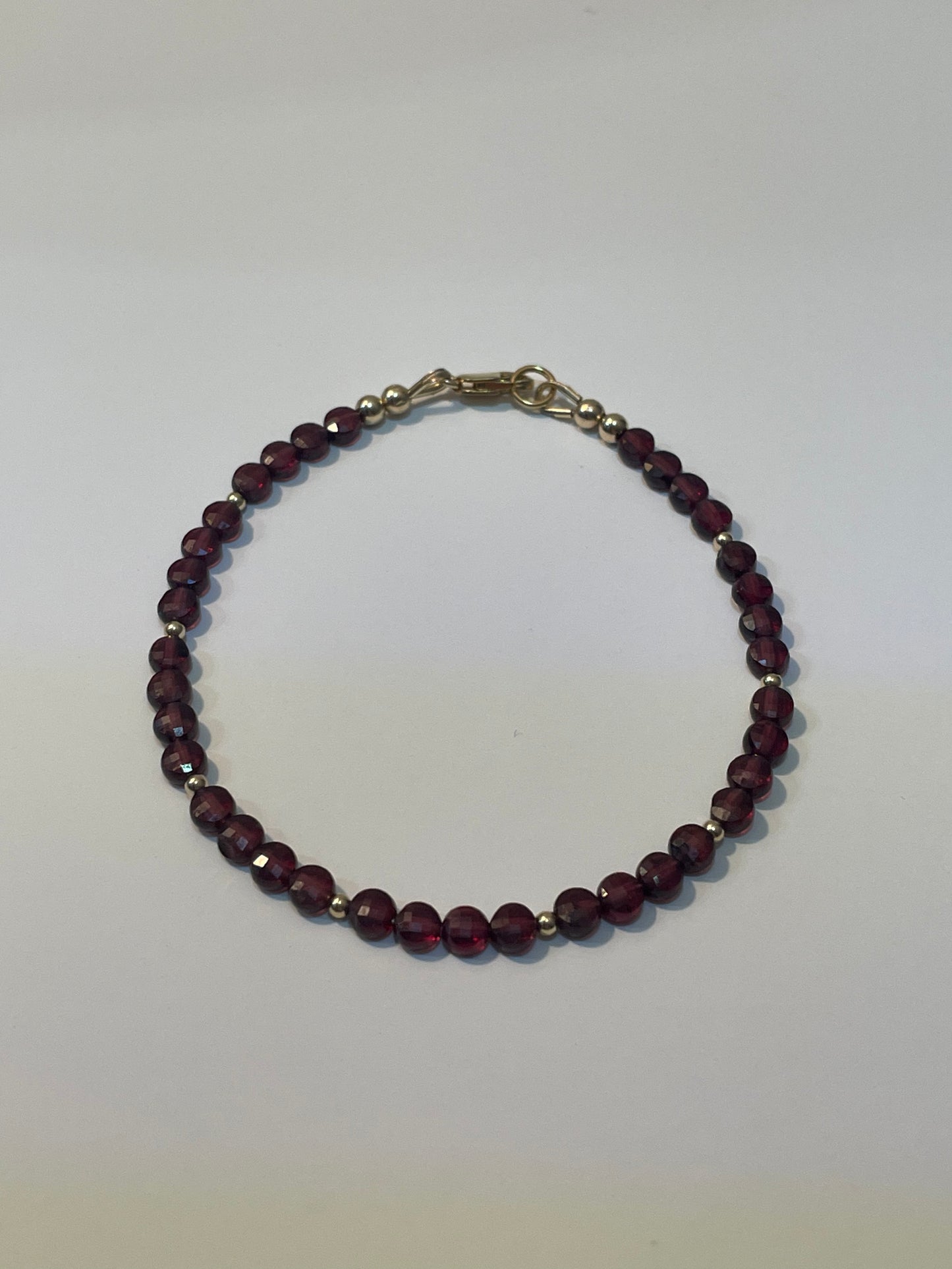 Garnet coin shaped bracelet