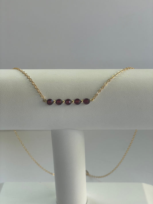 Garnet coin shape necklace